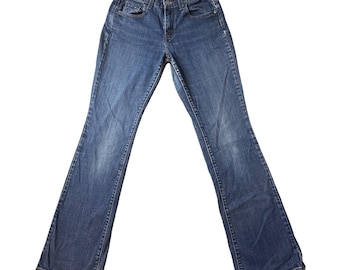 Vintage Levi's 515 Jeans Women 4 Medium Blue Boot Cut Denim Stretch Mid Rise Y2K