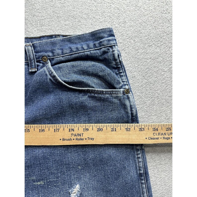 Jeans Wrangler vintage para hombre, talla 39x27.5, denim azul, tiro alto, desgastados, rotos, auténticos. imagen 10
