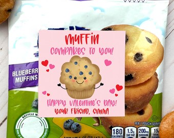 May include: A pink card with a cartoon muffin and the text "Muffin compares to you! Happy Valentine's Day! Your friend, Emma" on a bag of blueberry muffins.