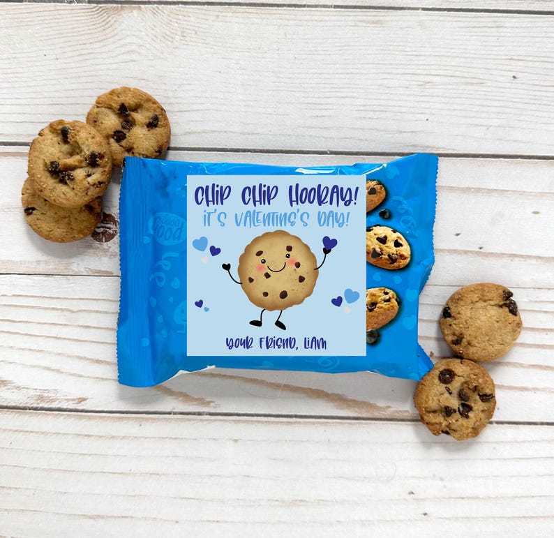 May include: A blue and white Valentine's Day gift bag with a chocolate chip cookie character saying "Chip Chip Hooray! It's Valentine's Day!" and the text "Your friend, Liam".