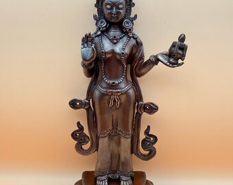 Mandarva Copper Statue on a stand