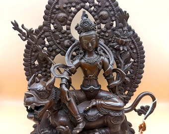 Manjushri on Lion copper statue