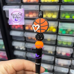 Caneta de basquete com contas