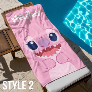 May include: Pink beach towel with a cartoon Stitch character and the name "Harley" printed on it.