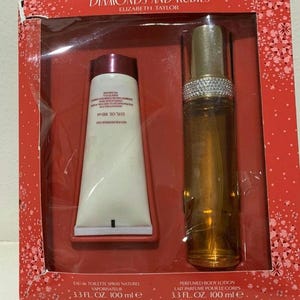 Diamond And Rubies doftset från Elizabeth Taylor 3.4 oz / 100 ml EDT Spray + 3.4 oz bodylotion. Nytt originalpaket. Se bilder.