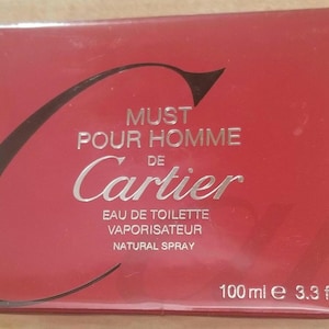 Must de cartier homme eau de Toilette spray for men 3.3 oz / 100 ml New in factory sealed retail packaging. Red box. Vintage.Discontinued