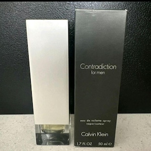 Fragranza Contradiction di Calvin Klein For Men EDT Spray 1,7 fl oz 50 ml Nuovo in scatola sigillata in fabbrica.