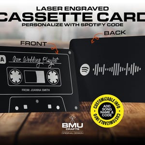 May include: A black cassette tape card with a Spotify code on the back. The front of the card has the text "Our Wedding Playlist" and "From: Joanna Smith".
