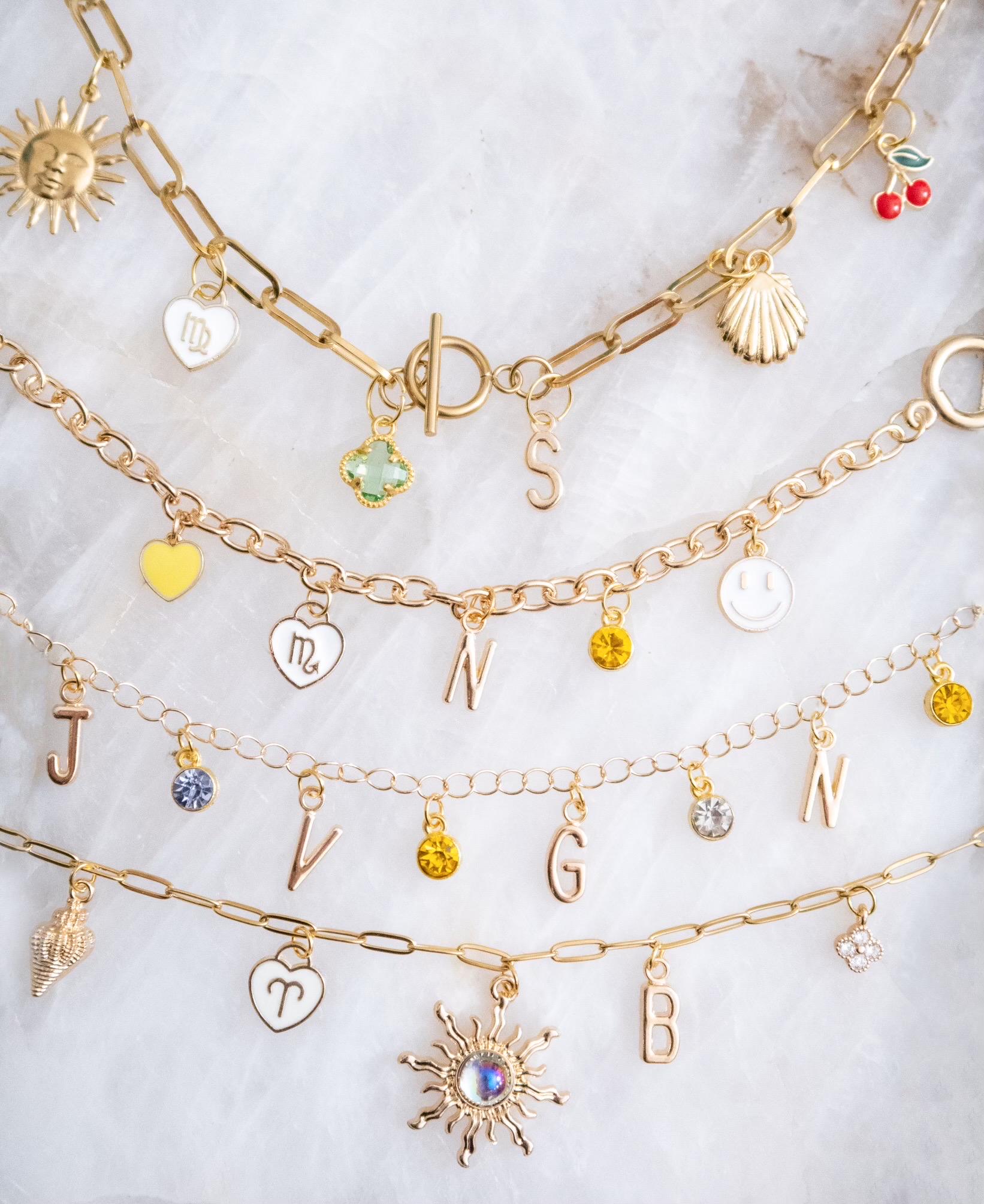 Collane e braccialetti con ciondoli personalizzati (confezione inclusa)