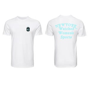 May include: White t-shirt with a small emblem on the front and text on the back. The emblem is a crown design with the letters "NY" inside a shield. The back of the shirt has the words "NEW YORK Watches Women's Sports" in a light blue color.