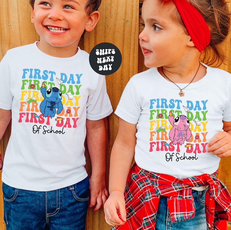 two young children standing next to each other
