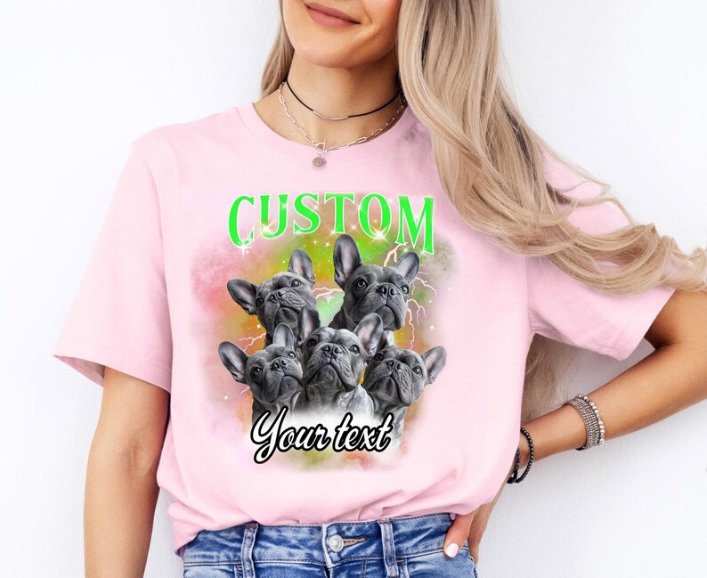 a woman wearing a pink shirt with three dogs on it
