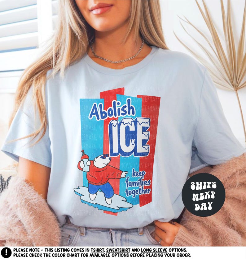 a woman wearing an ice t - shirt with a polar bear on it