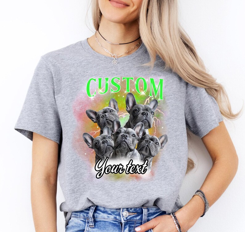 a woman wearing a t - shirt with three dogs on it