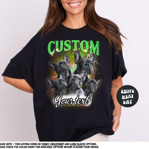 a woman wearing a black shirt with three dogs on it