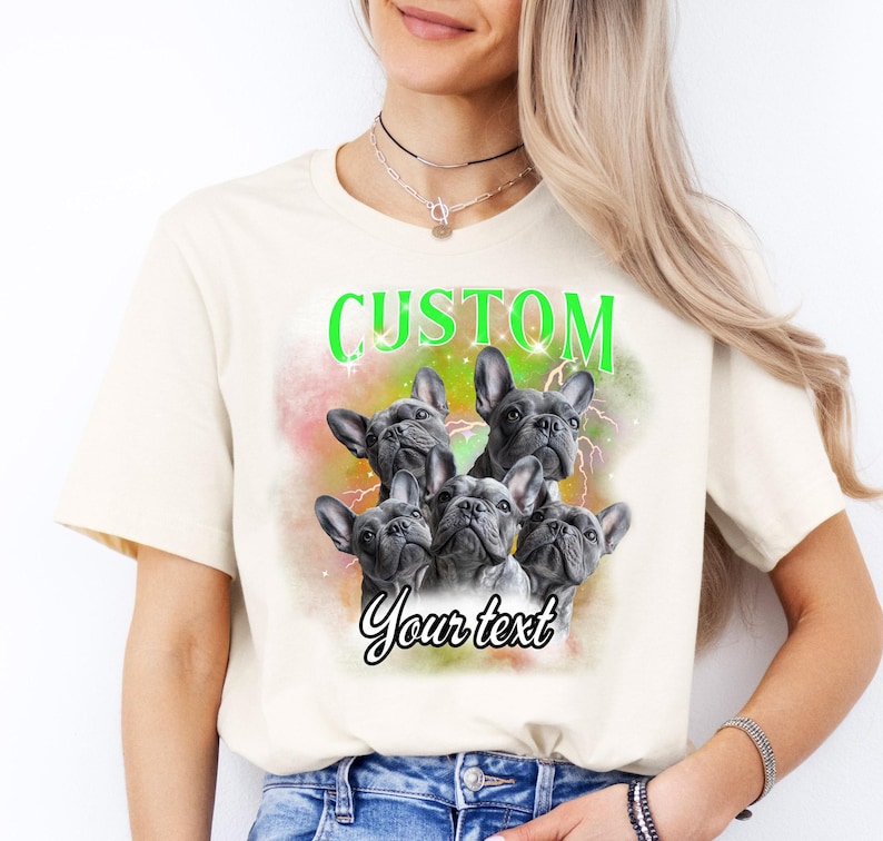 a woman wearing a t - shirt with three dogs on it