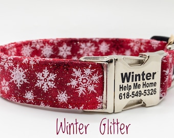 May include: Red dog collar with white snowflake pattern and silver buckle. The buckle has the text "Winter" and "Help Me Home" with a phone number.