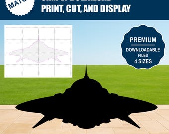 May include: A black silhouette of a spaceship with a domed top and wing-like extensions, set against a backdrop of a grassy field and blue sky. The image includes text that reads "SIMPLY DOWNLOAD PRINT, CUT, AND DISPLAY" and "PREMIUM DOWNLOADABLE FILES 4 SIZES".