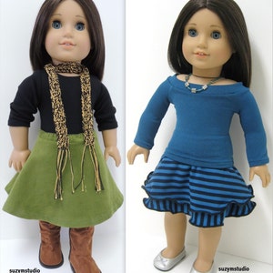 Op de afbeelding: Twee poppen die verschillende outfits dragen. De pop links draagt een zwart shirt met lange mouwen, een groene rok, een bruine sjaal en bruine laarzen. De pop rechts draagt een blauw shirt met lange mouwen, een blauw-zwarte gestreepte rok en zilveren schoenen. Beide poppen hebben lang bruin haar en blauwe ogen.