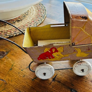 Blikken Litho Wyandotte-babypoppenwagen uit de jaren 30
