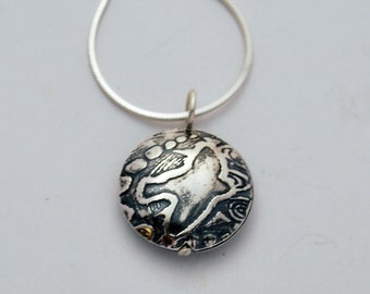 Small Sterling Silver Bird on the Wing Capsule Pendant