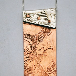 Copper and silver Magpie or owl necklace