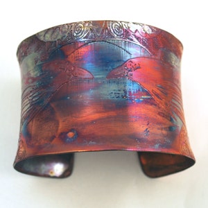 Etched Copper anticlastic Cuff Bracelet with raven or moon gazing hare design