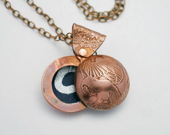 Copper owl swivel locket