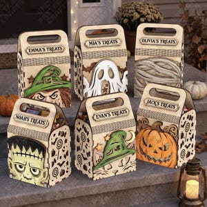 May include: Six wooden treat boxes with handles, each featuring a unique Halloween character: a witch, ghost, mummy, Frankenstein's monster, cat with a witch hat, and jack-o'-lantern. Each box is personalized with a name and the word TREATS.