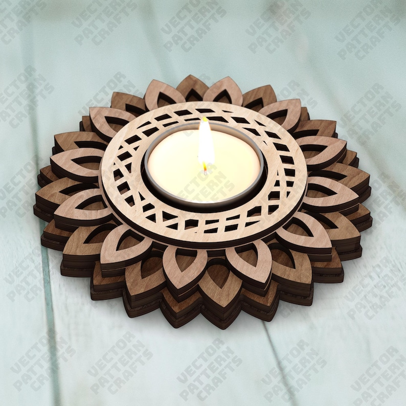 May include: A wooden candle holder with a sunflower design. The holder has a circular center with a geometric pattern, holding a lit candle. The base is made of layered wooden petals. The candle flame is bright.