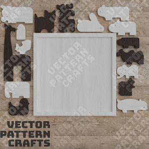 Puede incluir: Un conjunto de formas de animales de madera en blanco y negro, que incluyen una jirafa, un elefante, un hipop&oacute;tamo y otros animales. Las formas est&aacute;n dispuestas alrededor de un cuadrado blanco con el texto "VECTOR PATTERN CRAFTS" en &eacute;l.