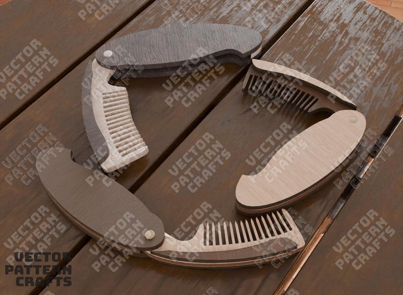 May include: A wooden comb with a folding design. The comb has a brown wooden handle and a silver metal comb. The comb is folded in half and the handle is on the outside of the fold. The comb is on a wooden surface.