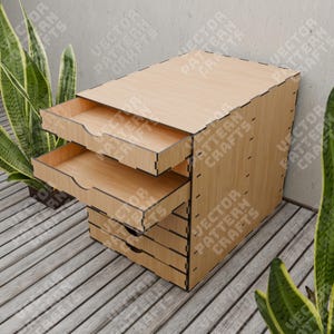 May include: A wooden organizer with five drawers. The drawers are open and the organizer is made of light brown wood.