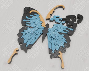 May include: A wooden butterfly puzzle with blue and brown wings. The puzzle is made up of many small pieces that fit together to form the shape of a butterfly.