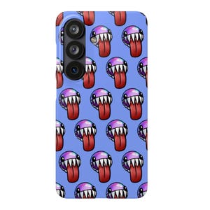 May include: A rectangular phone case with a light blue background featuring a repeating pattern of cartoonish purple spherical creatures. Each creature has sharp white teeth, a large red tongue hanging out, and small black eyes on a glossy surface.