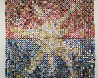 May include: A large mosaic artwork made from bottle caps. The artwork is composed of a variety of colors, including red, orange, yellow, blue, green, and purple. The bottle caps are arranged in a grid pattern, creating a visually appealing and unique design.