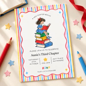 May include: A rectangular invitation card with a colorful vertical striped border and a scalloped inner frame. The center features an illustration of a child reading a book while sitting on a stack of four books. Text reads: A NEW CHAPTER BEGINS, PLEASE JOIN US TO CELEBRATE Annie's Third Chapter, SATURDAY 10TH OCTOBER, 1PM-3PM, ANY PLACE ANYWHERE, RSVP Sadie 07123456789.