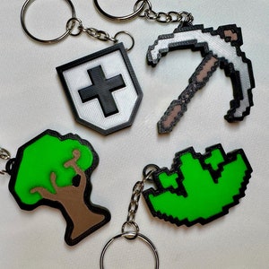 3D printed Old School RuneScape skill icon keychains featuring vibrant, pixelated designs. Includes iconic skills like Mining, Herblore, and defense. Perfect for RuneScape fans to show off their love for the game as stylish and durable accessories.