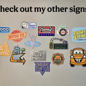 May include: A collection of colorful, die-cut signs featuring various designs and text. Signs include "Mood Springs," "Motor Oil," "Cozy Cone Motel," "Ding Park," "Heavy Metal Mater," and "Air Mater." The image also includes the text "Check out my other signs!"