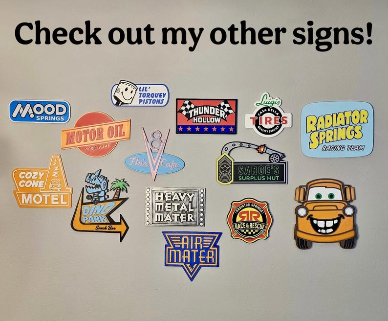 May include: A collection of colorful, die-cut signs featuring various designs and text. Signs include "Mood Springs," "Motor Oil," "Cozy Cone Motel," "Ding Park," "Heavy Metal Mater," and "Air Mater." The image also includes the text "Check out my other signs!"
