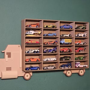 3D-printed truck-themed wall shelf with wooden finish PLA, designed for car storage. Ideal for adult and child car collectors to organise and display collectables neatly in 24 compartments. A functional decor piece that adds charm to any room.