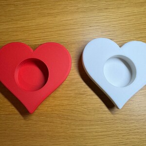 3D printed heart-shaped tealight holder with smooth, realistic, rounded edges. Perfect for LED or real flame candles. Available in various colours and pack sizes. Ideal for Valentine’s Day, romantic gifts, anniversaries, or cosy home decor.