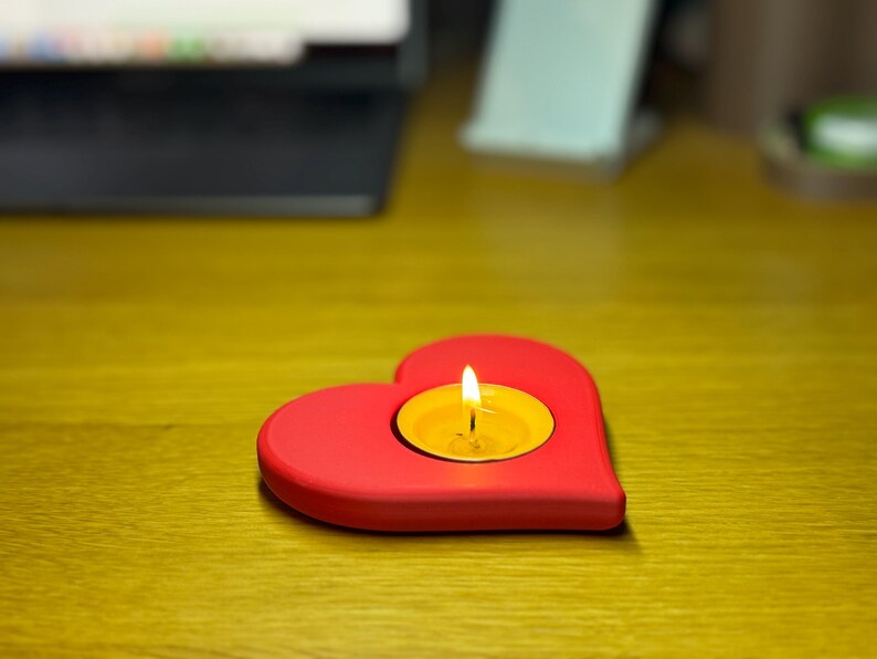 3D printed heart-shaped tealight holder with smooth, realistic, rounded edges. Perfect for LED or real flame candles. Available in various colours and pack sizes. Ideal for Valentine’s Day, romantic gifts, anniversaries, or cosy home decor.