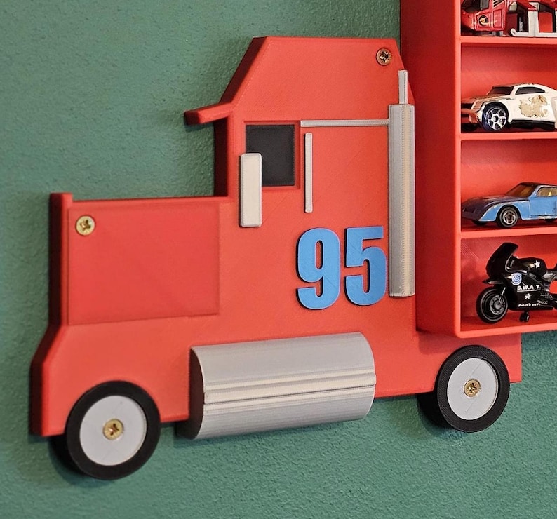 Vibrant red truck with iconic “95” design inspired by Disney Cars. Adds charm and realism to any Hot Wheels or Matchbox display. Perfect for fans and collectors seeking creative, tidy organisation for shelves.