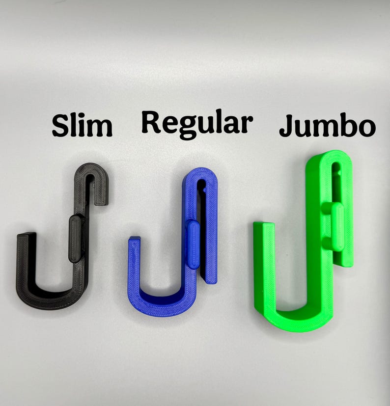 May include: Three plastic hooks in different sizes: slim, regular, and jumbo. The hooks are black, blue, and green.
