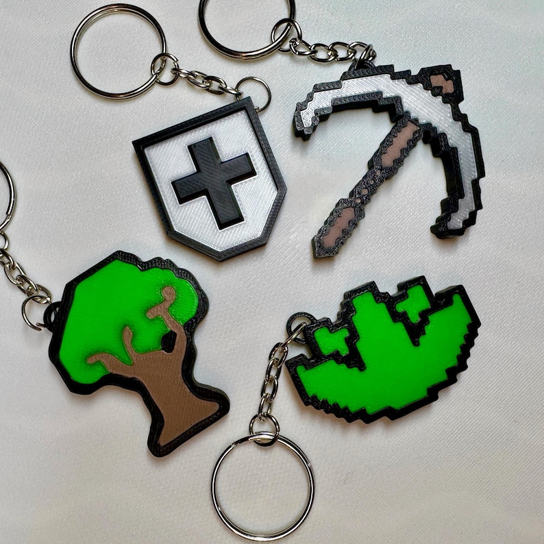 3D printed Old School RuneScape skill icon keychains featuring vibrant, pixelated designs. Includes iconic skills like Mining, Herblore, and defense. Perfect for RuneScape fans to show off their love for the game as stylish and durable accessories.
