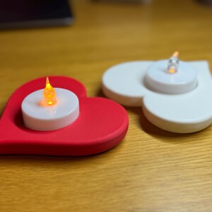 3D printed heart-shaped tealight holder with smooth, realistic, rounded edges. Perfect for LED or real flame candles. Available in various colours and pack sizes. Ideal for Valentine’s Day, romantic gifts, anniversaries, or cosy home decor.