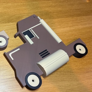 Truck-shaped dark wood effect piece for stylish organisation. Ideal for Hot Wheels, Matchbox, or Disney Cars displays. Upgrade your space with a durable and tidy solution to complement any shelf or decor while adding a creative and functional touch.