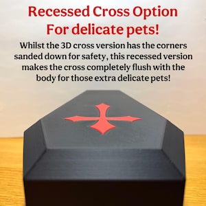 A black 3D-printed gothic reptile hide with a recessed red cross on top. Text overlay highlights the flush design, making it safer for delicate pets. Ideal for snakes, geckos, and other small reptiles.
