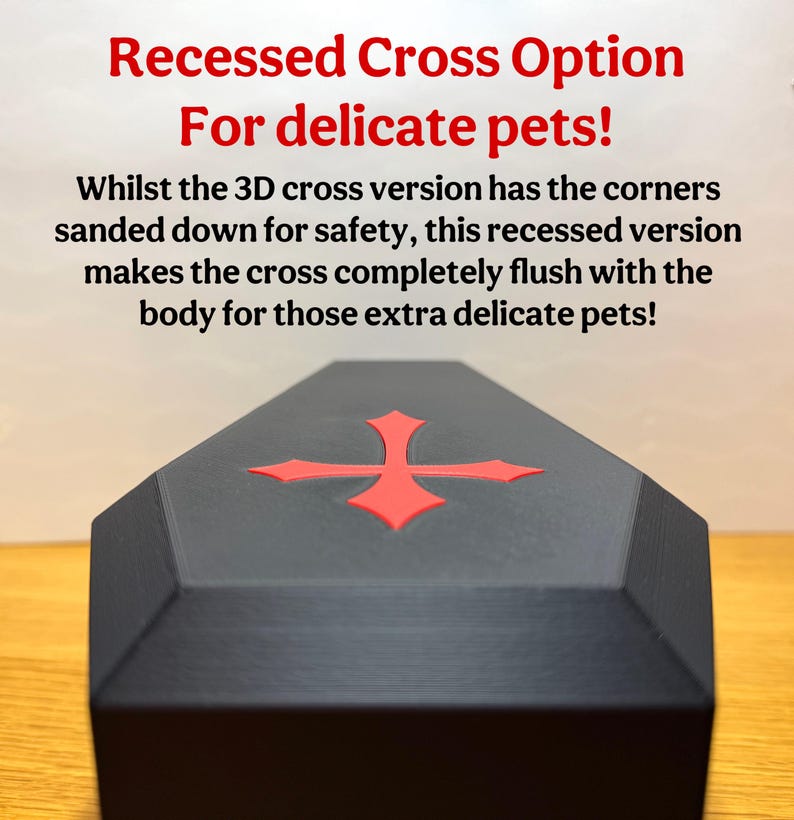 A black 3D-printed gothic reptile hide with a recessed red cross on top. Text overlay highlights the flush design, making it safer for delicate pets. Ideal for snakes, geckos, and other small reptiles.